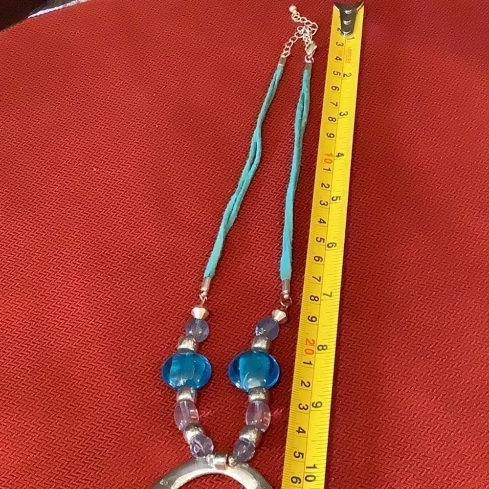 Statement necklace blue leather with blue glass beads silver metal pendant